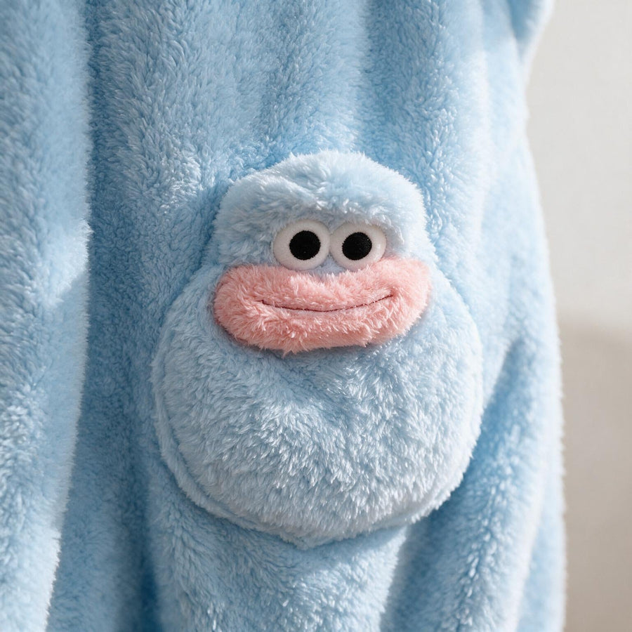 Close-up of the monster face patch pocket on the thigh